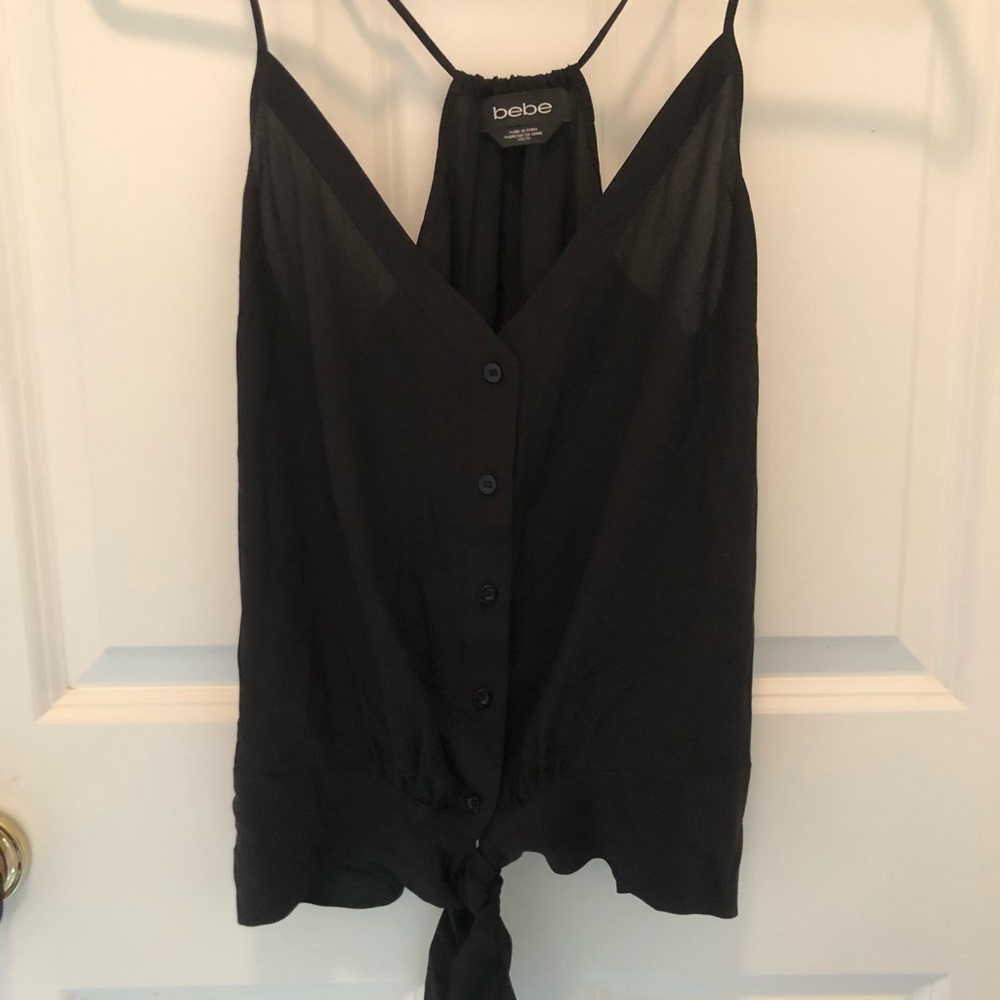 Bebe button down blouse with tie at the end.